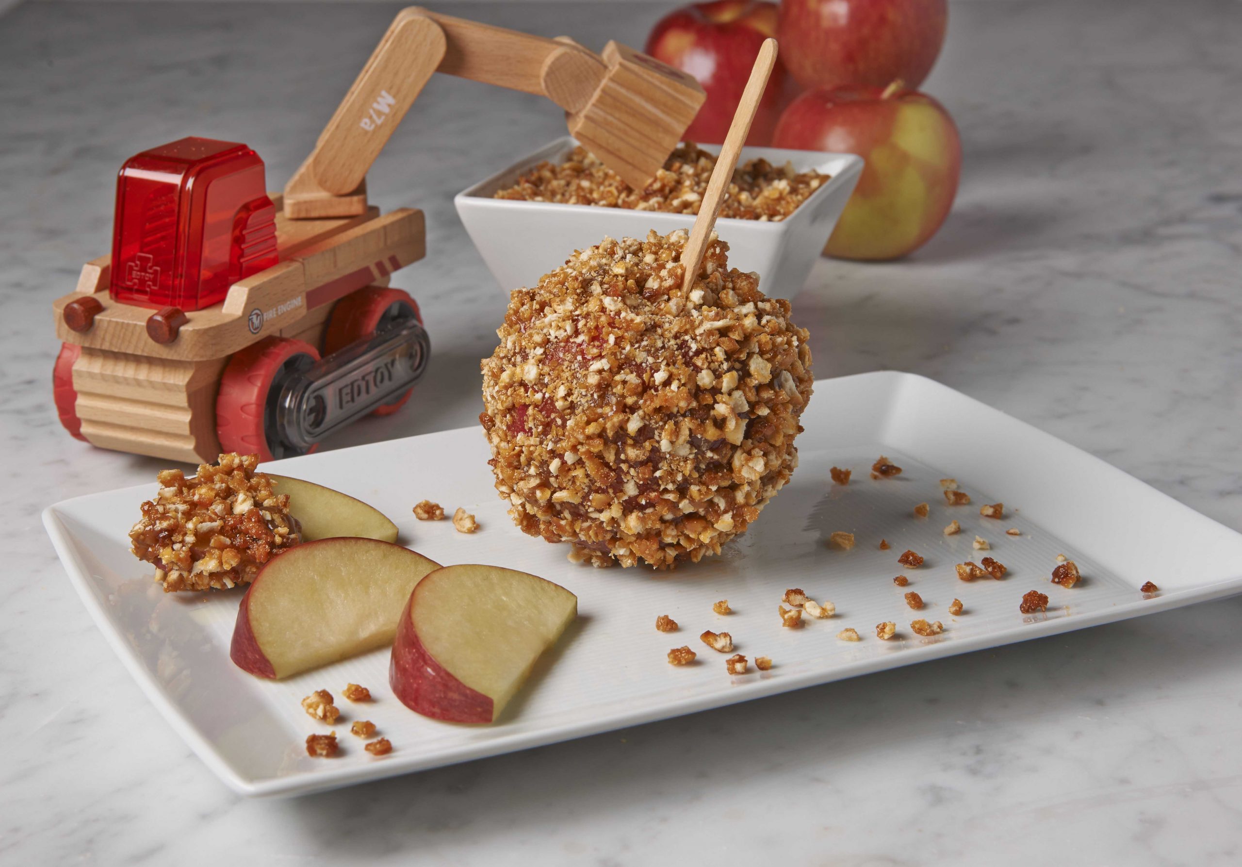 Caramel Apples Dipped in Candied Tam Tams - Manischewitz